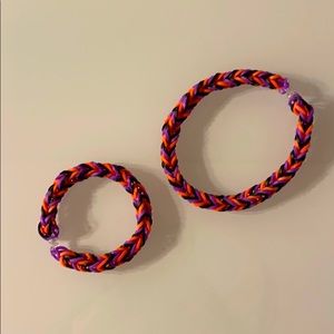2 homemade rubber brand bracelets❤️